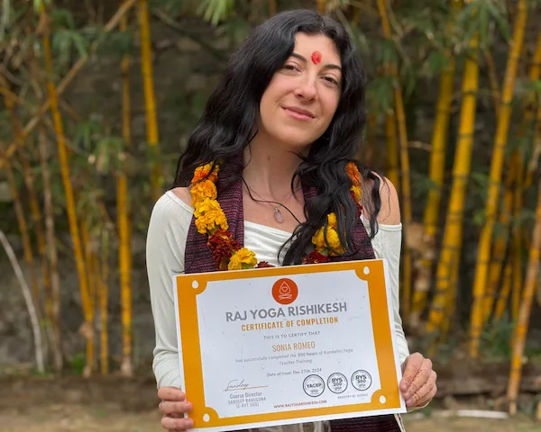Students receiving Yoga Alliance certification at Raj Yoga Rishikesh, India
