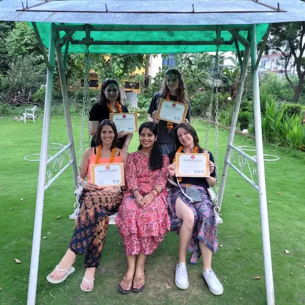 A diverse group of yoga students at Raj Yoga Rishikesh