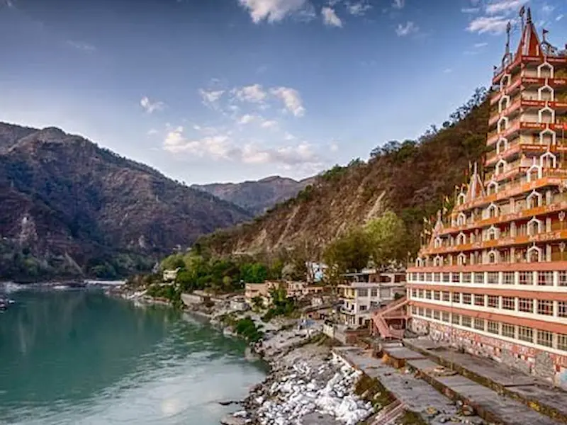 Scenic view of the Ganges River and mountains in Rishikesh